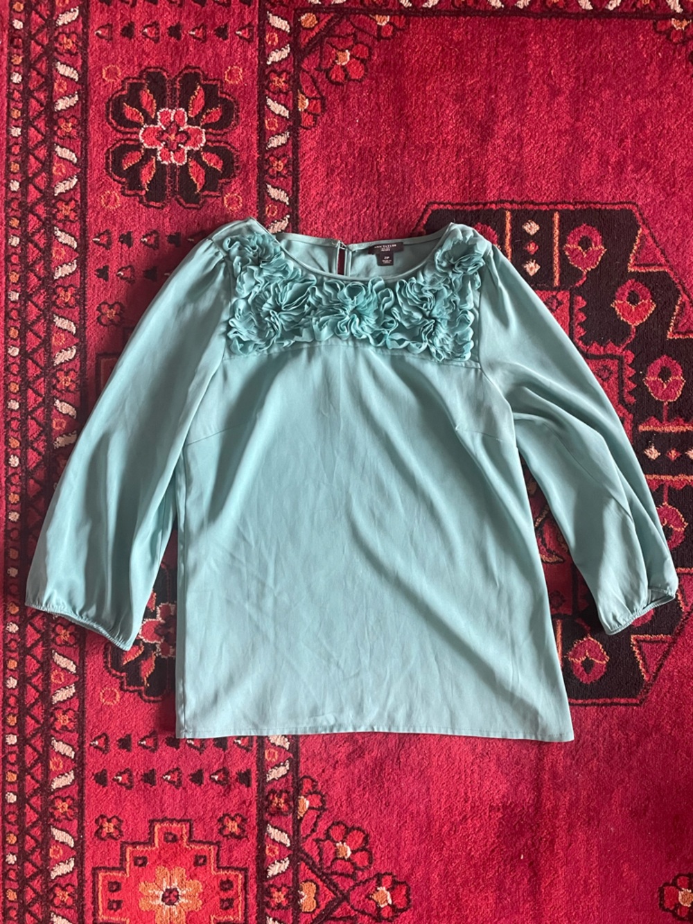 Ann Taylor turquoise blouse with flower ruffles